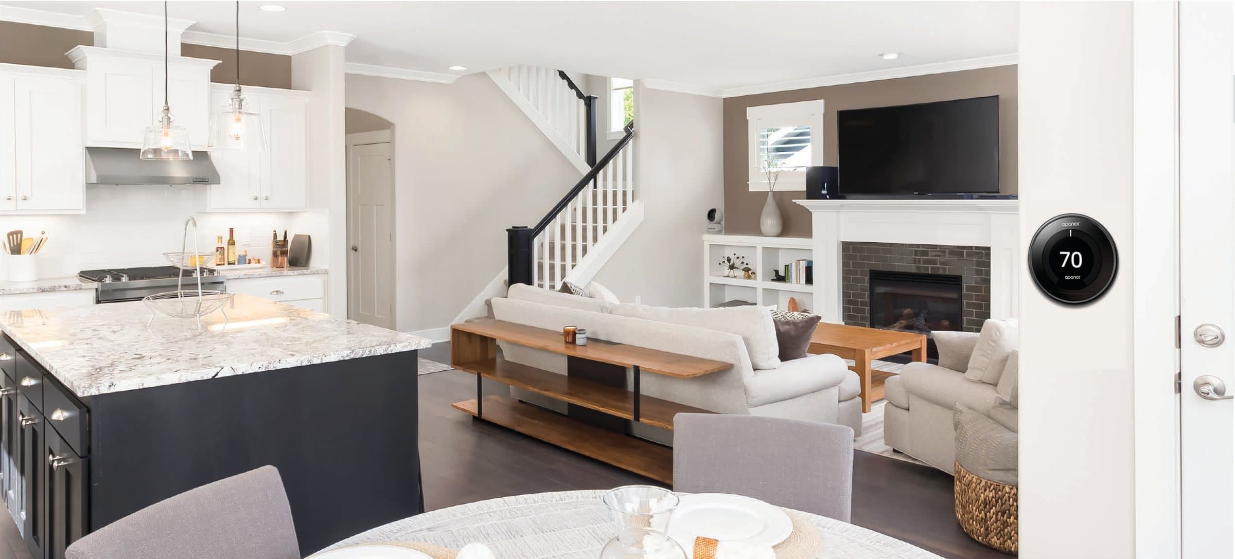 Open-plan kitchen and living room with an Apaniot smart thermostat on the wall