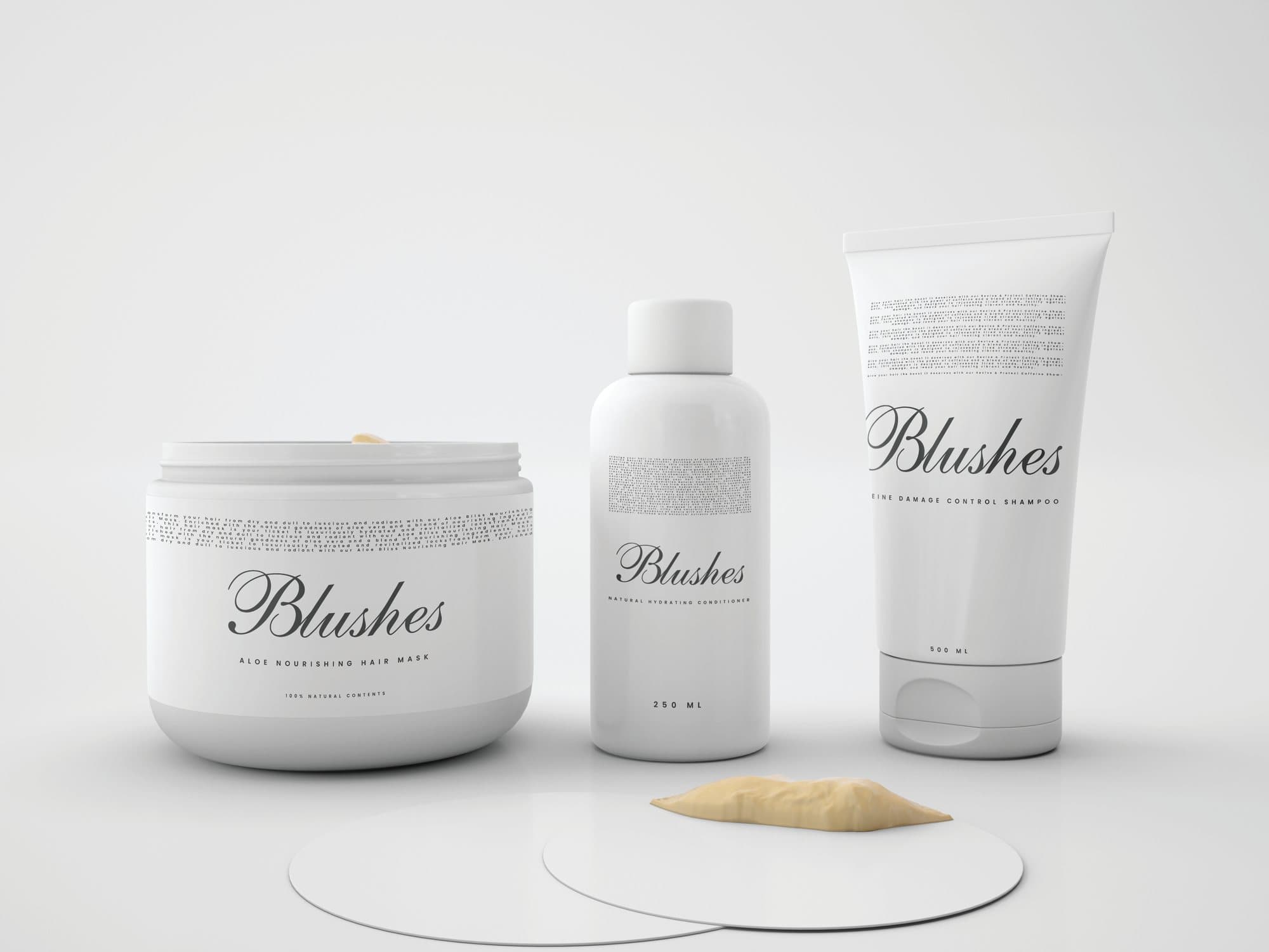 Blushes hair-care range: a hair mask jar, conditioner and shampoo in white packaging